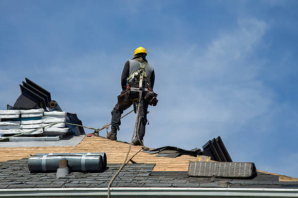 Professional Roof Replacement technician working in Winsted, CT